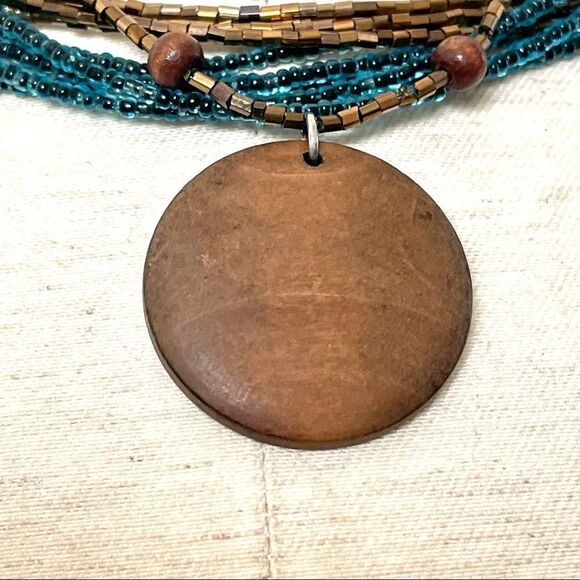 Blue and gold beaded multi strand wood pendant necklace - Picture 4 of 10